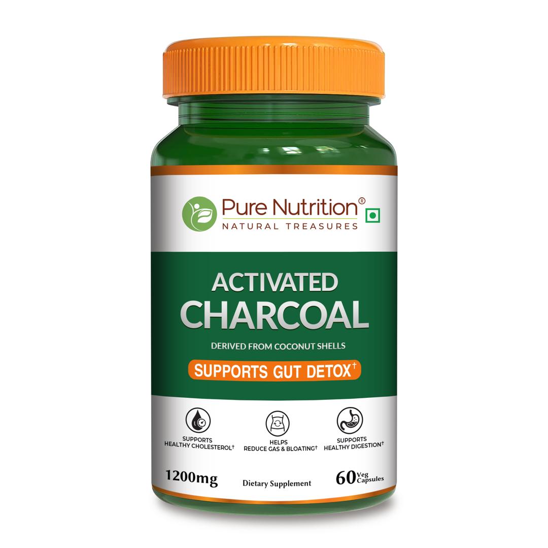 Green and orange Pure Nutrition Activated Charcoal 1200 mg bottle with 60 veg capsules on a white studio background